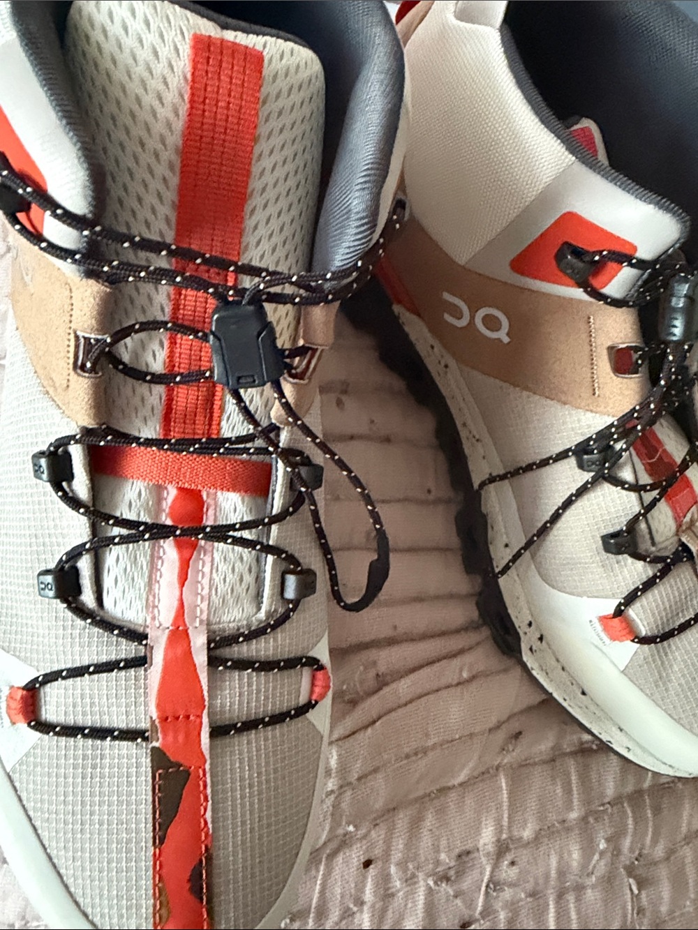 On Running Trail Shoes in White, Orange, Tan and Black